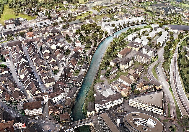 Weisse Häusergruppen: Wohnsiedlungen Nau Süd und Nau Nord, dazwischen die Birs. Foto: zvg