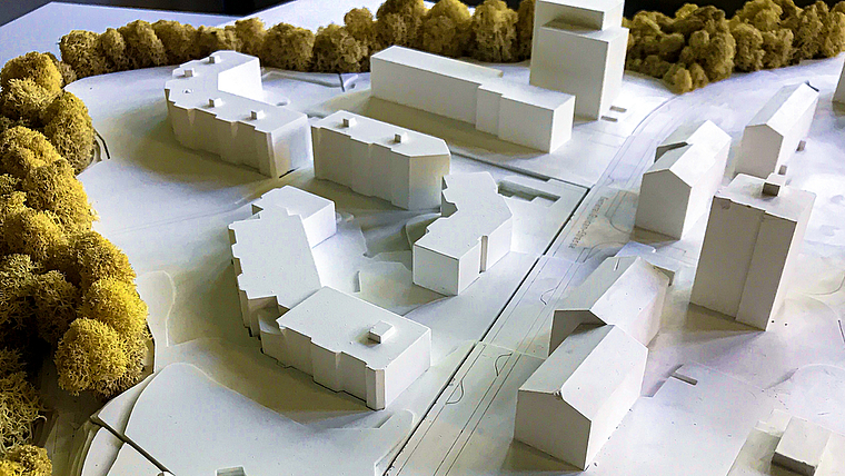 Schneckenbündten 2: Drei Gebäude sollen entlang des Waldrandes entstehen und sich ins Quartier einfügen. Visualisierung: ZVG